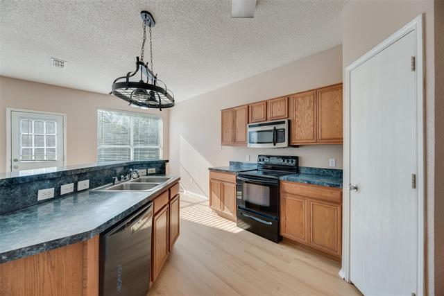 Building Photo - 6464 Downeast Dr