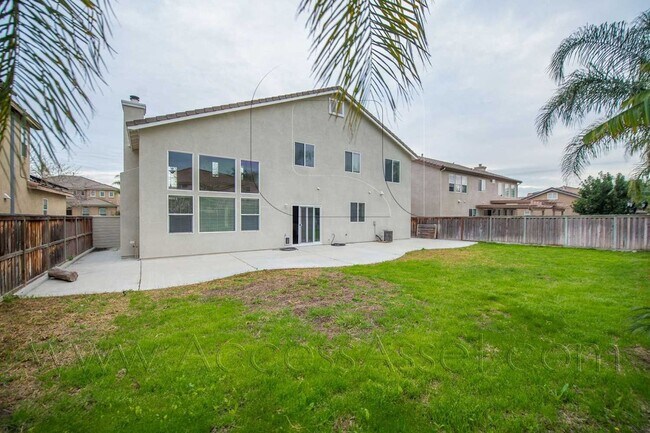 Building Photo - Open-Concept 4BD Home with Granite Counters & Attached Two-Car Garage