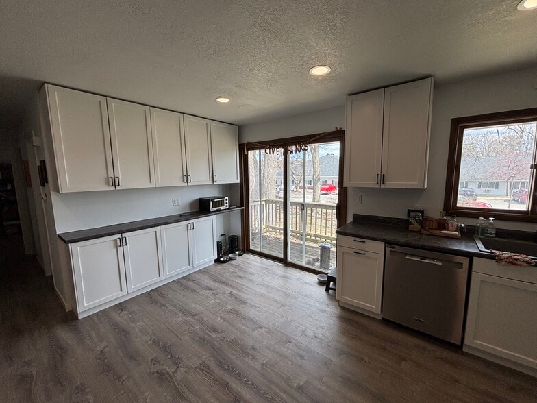 View from the kitchen to balcony & backyard - 107 11th Ave S