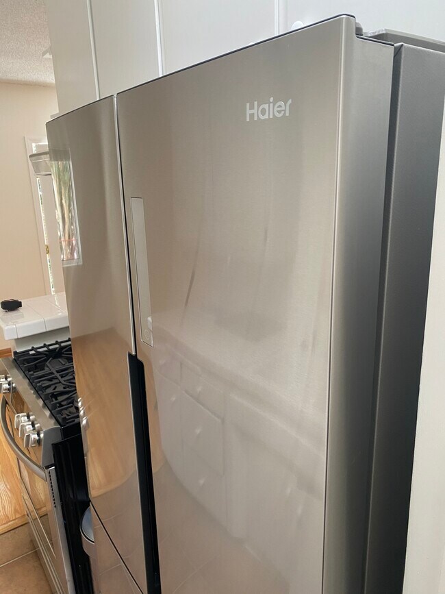 New Haier Refrigerator - 1739 Washington Way