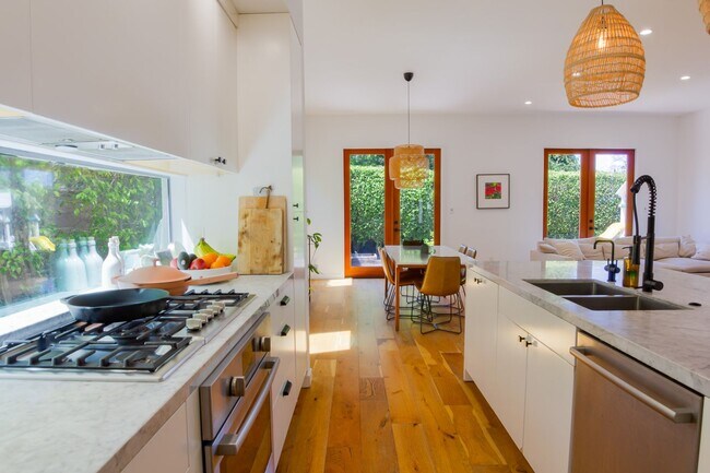 Building Photo - Spacious 4BR/3BA Westchester Home with Private Backyard, BBQ & Security System