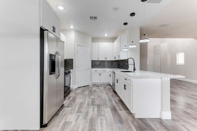 Building Photo - Modern Two-Story Home with Stylish Kitchen...