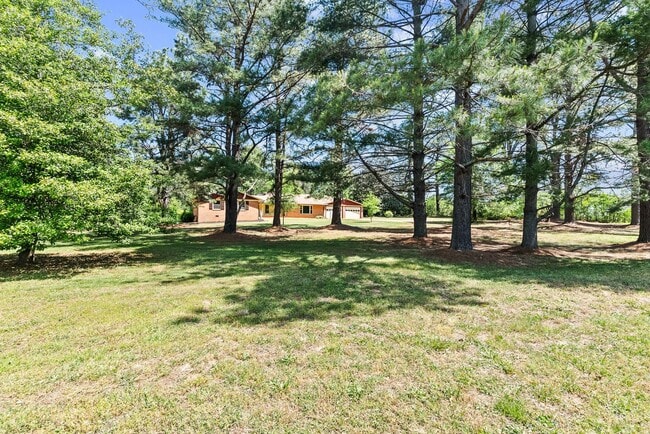 Building Photo - Large 4-Bed Brick Rancher with 2-Car Attached Garage!