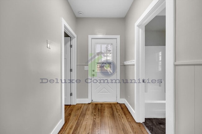 Building Photo - Spacious 4 Bedroom- With Extra room! New Remodel!