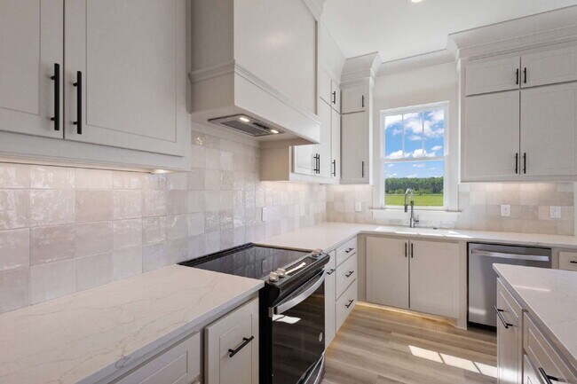 Building Photo - Luxury Townhome for Rent in Waterpointe | 3 Bed | 2.5 Bath | Private Courtyard