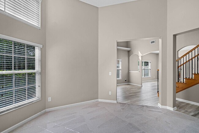 Building Photo - 4/2.5/2 Woodland Lakes Preserve Available Now