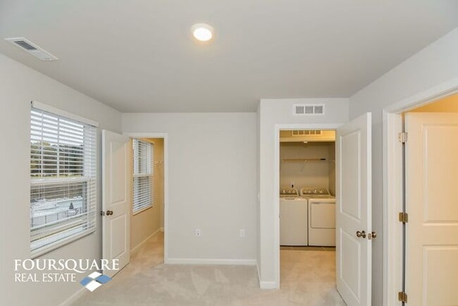 Building Photo - Modern 3-Story Townhome with First-Level Bedroom, Open Floor Plan & Community Pool – Prime RTP Lo...