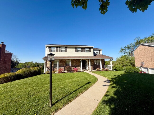 Building Photo - Modern Comforts Await: Spacious Rental with 2-Car Garage, Private Office, and Finished Basement w...
