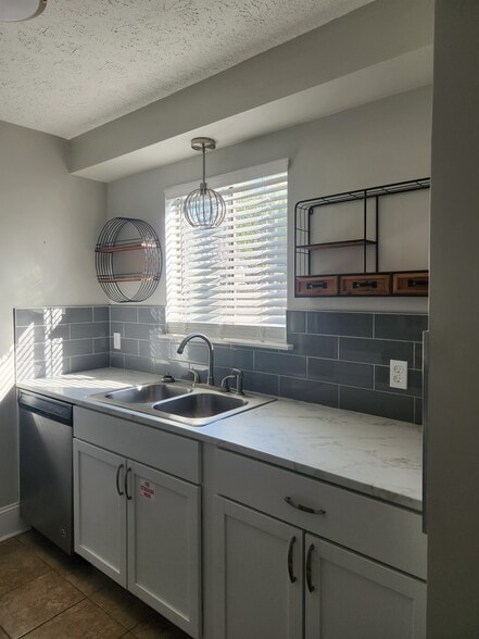 New counter tops and cabinets - 2510 W 9th St