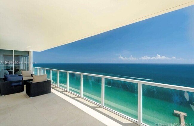 Building Photo - 16699 Collins Ave