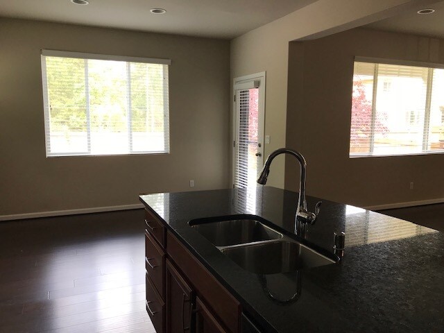 Dining room off kitchen, door to backyard - 8828 Jayden Ln NE