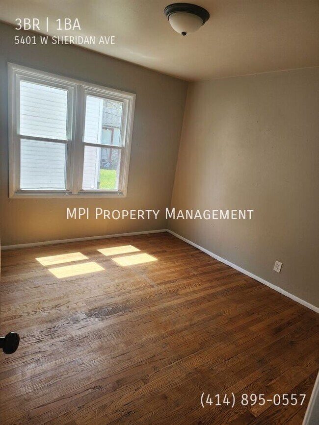 Building Photo - 5401 W Sheridan Ave