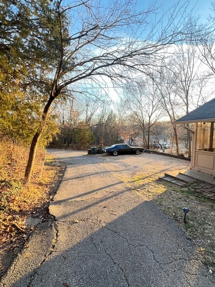 Driveway and Parking Area - 214 E Cleburn St