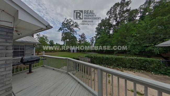 Building Photo - Spacious 4-Bedroom Home with Solar Panels ...
