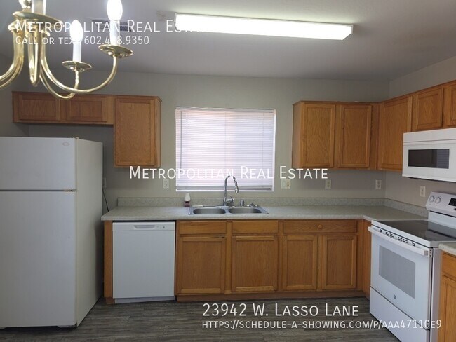 Building Photo - 23942 W Lasso Ln