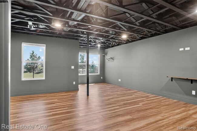 Building Photo - Modern 3-Bedroom Condo in Lake Orion Near I-75