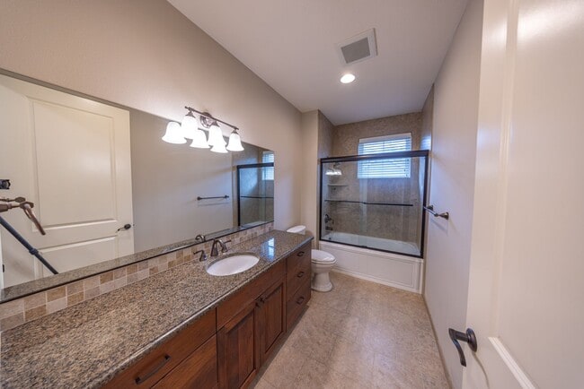 Building Photo - 2 Creeks Condominiums - Gated Community on...