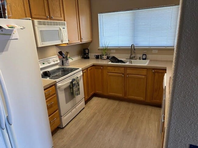 Building Photo - Cozy 2-Bedroom, 2-Bathroom Condo at The Boulders at Broadlands – Available May 5!