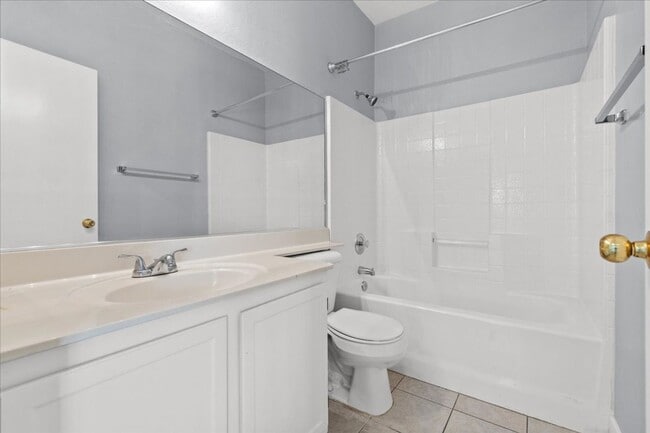 Building Photo - Sleek 2 Bedroom Condo with 2 Car Garage Ne...