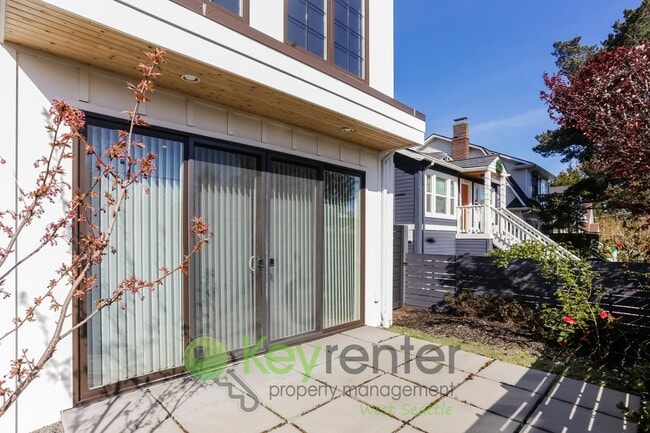 Building Photo - Spacious Living with Balconies, Deck, and Private Yard