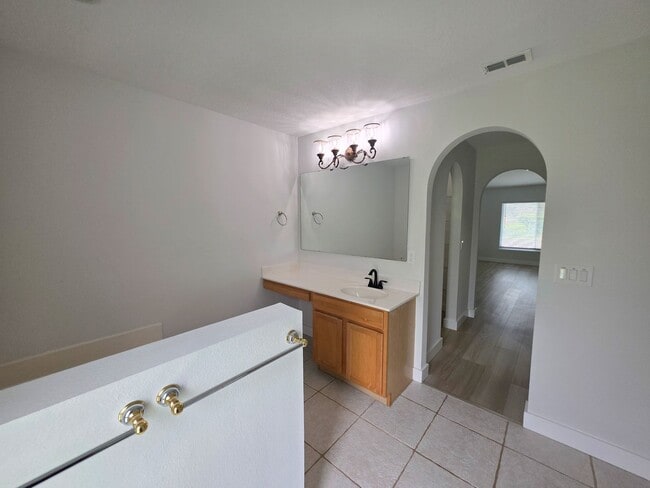 Building Photo - Beautiful 4 Bedroom in Gated Compass Pointe