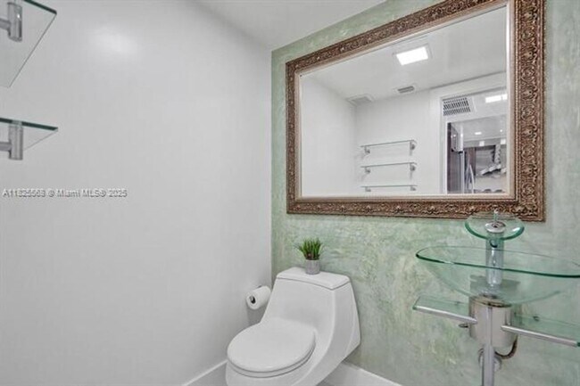 Building Photo - 6450 Collins Ave