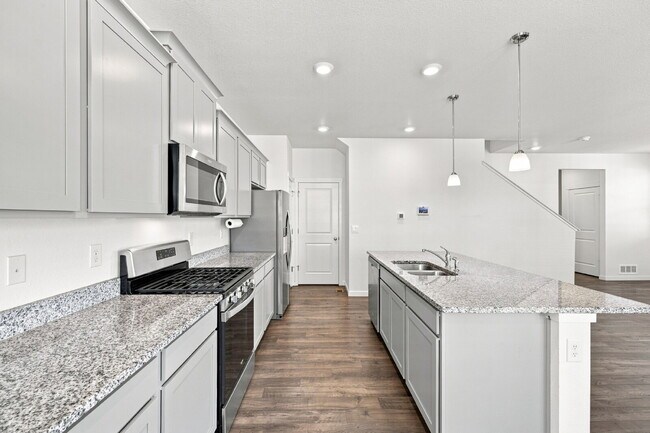 Building Photo - Spacious 4 Bedroom, 2.5 Baths in Bennett! 3 Car Attached Garage. Corner Lot!