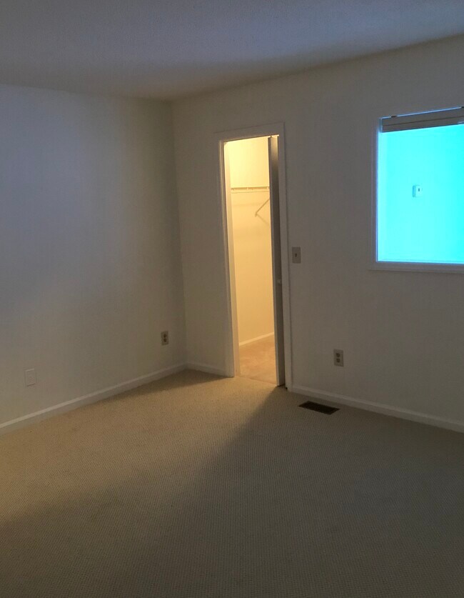View in bedroom to one of the walk in closets - 11 Pinehurst Mnr