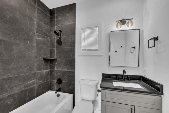 Building Photo - Modern New Construction Townhome with Roof...