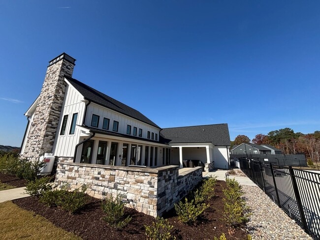 Building Photo - Beautiful 3 Bed+Bonus+2 Car Garage Townhome in New Wake Forest Community