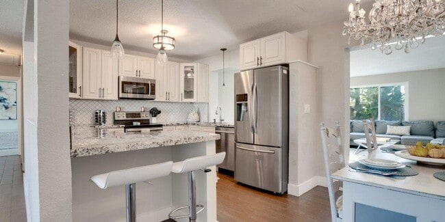 Building Photo - Step Into Sunshine: Modern Charm Meets Coa...