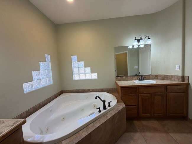 Building Photo - 4 Bedroom Single Story Custom Home Available In Rio Rancho Near Unser Blvd SE & Westside Blvd SE!