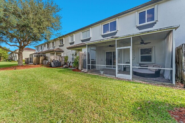 Building Photo - Stunning lakefront townhouse in gated Homestead community.