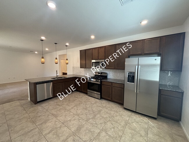 Building Photo - 7095 W Jadewood Ln