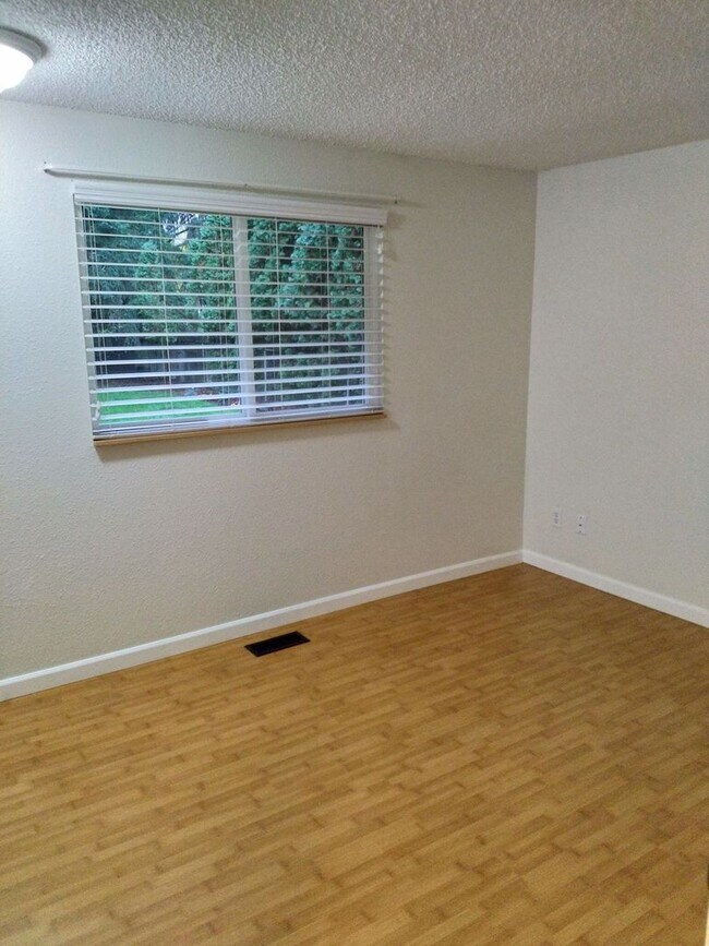 Building Photo - Charming updated 3 bed 1 bath ranch style home with double car garage and large fenced back yard.