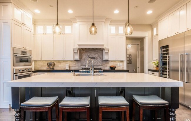 Building Photo - Luxurious Herriman 6 Bed with Indoor Court, Theater & Stunning Views!!!