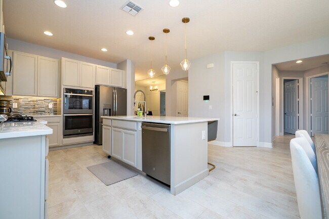 Building Photo - "Spacious 4-Bedroom Retreat with 3 Full Baths in Winter Garden's Serene Sanctuary"