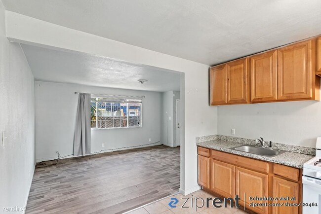 Building Photo - 2 br, 1 bath Triplex - 1466 77th Avenue, O...