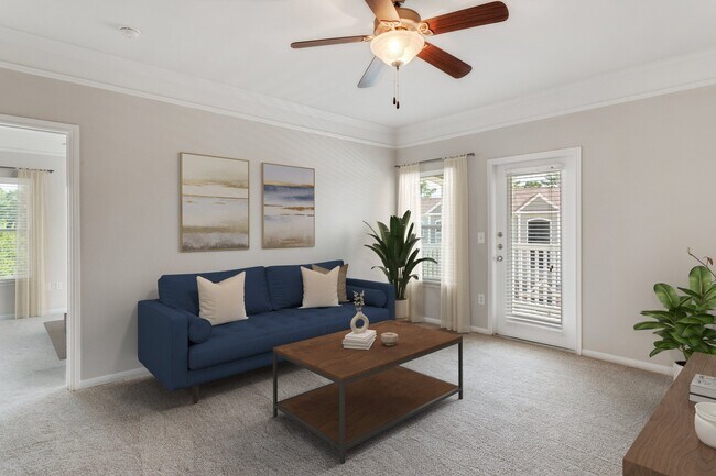 Living Room with Balcony - Carrington Park at Huffmeister Apartments