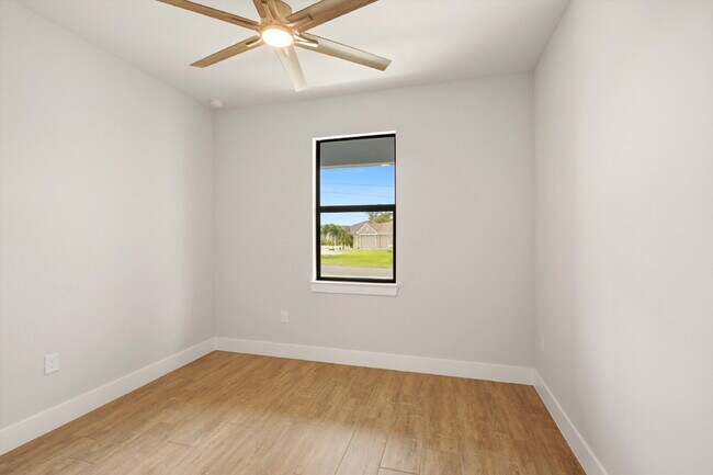 Building Photo - Brand New Canal-Front Pool Home for Rent, 3/2/2, NE Cape Coral. The Builder Didn't Cut Corners, S...