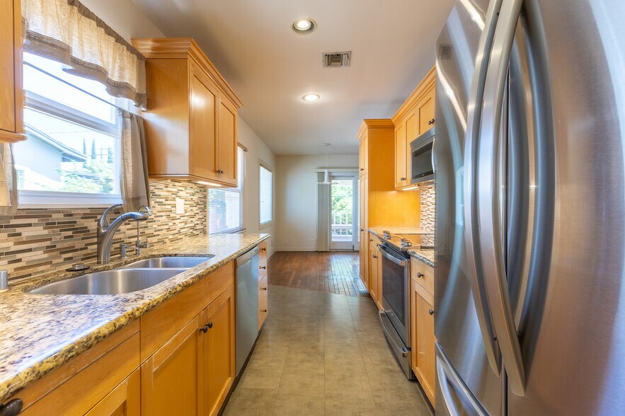 Kitchen looking into dining room - 7246 Hatillo Ave