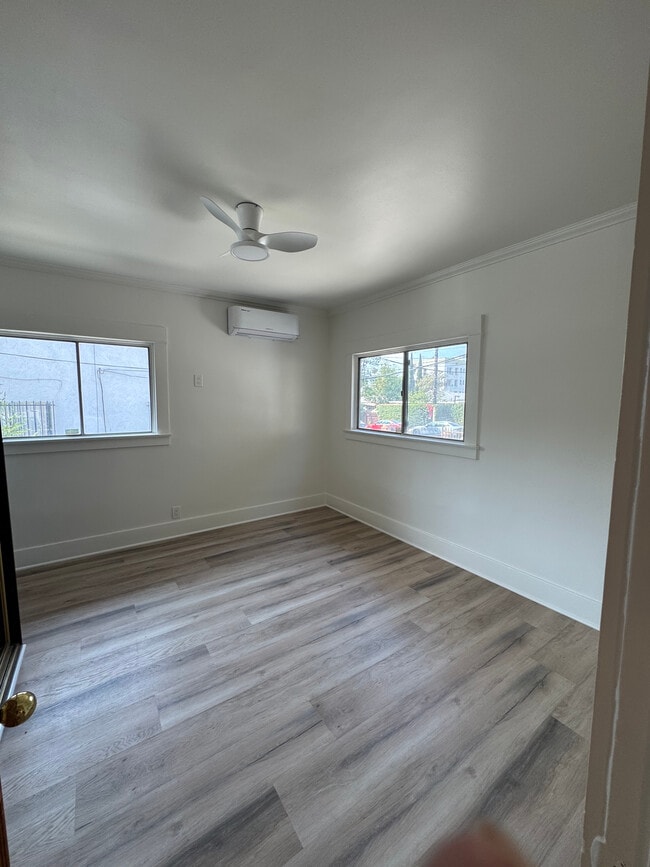 Spacious bedroom with AC, fan and huge closet - 1536 North Mariposa Avenue