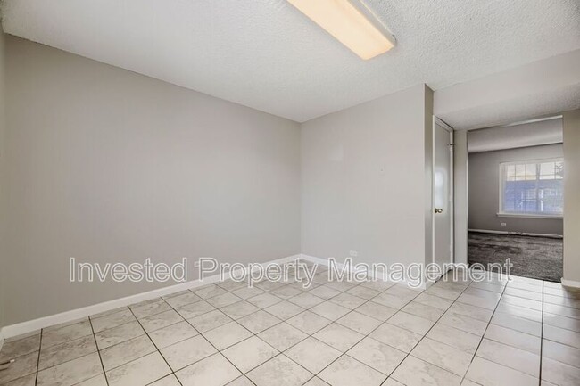 Building Photo - 9330 E Girard Ave