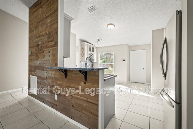 Building Photo - 4820 Wandering Pines Trail S