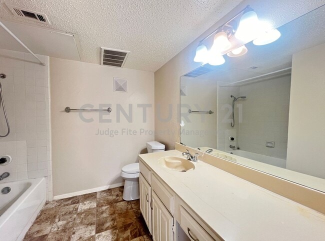 Building Photo - Beautiful 2-story 1/1.5 Mediterranean Style Condo in Gated Dallas Community For Rent!