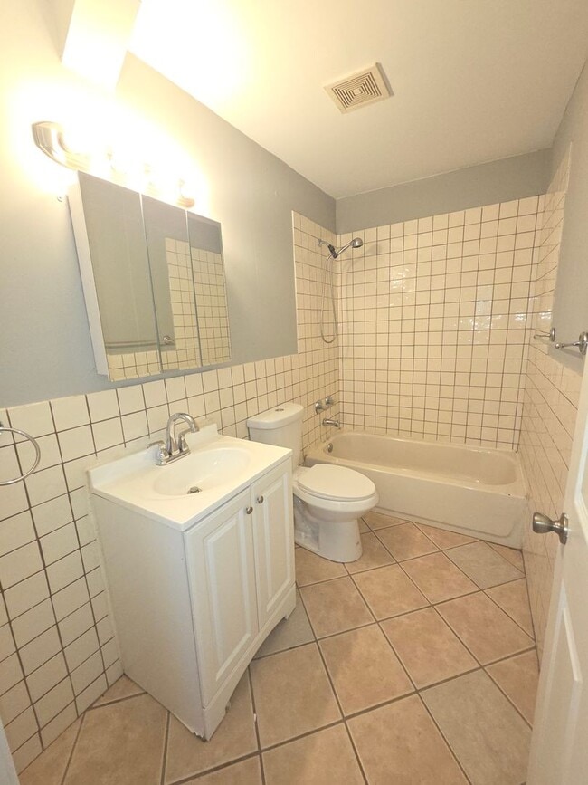 Building Photo - Single Family House with finished basement, garage, and backyard!