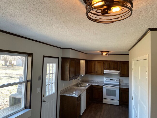 Building Photo - Rogersville Living at a great price .-COMING SOON