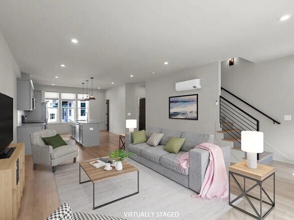 Open concept living room / kitchen - 339 E Village Ln