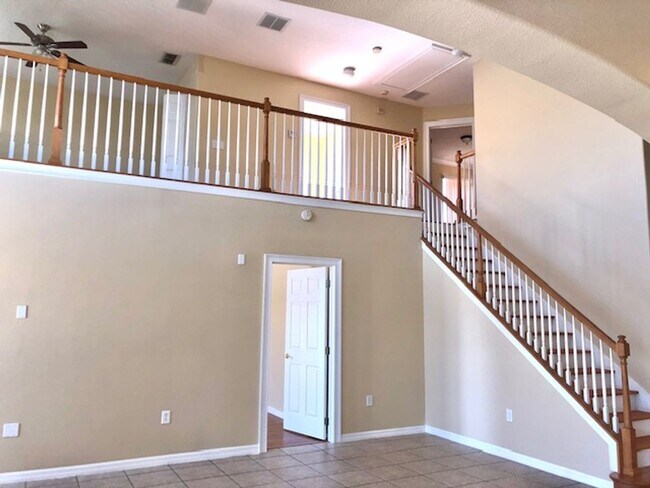 Building Photo - EAGLE CREEK LAKE NONA! WELCOME HOME! Beautiful water views! Spacious 2 story-3 bedroom 2.5 bath h...