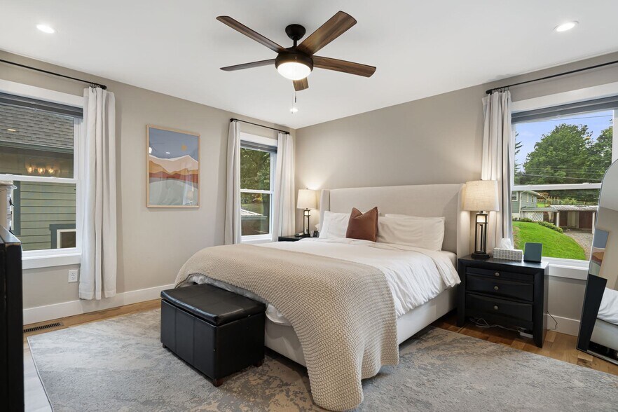 Primary bedroom with great natural light and pull-down blackout shades. - 33 Rex Dr